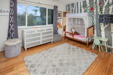 3 additional bright and airy bedrooms with sparkling windows, designer lighted ceiling fans, ample closet space to maximize storage and glistening hardwood floors.