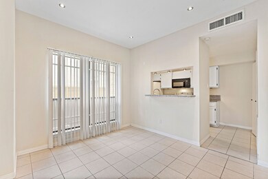 This large window in the dining area brings in ple