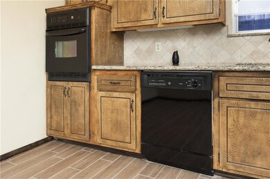 Built in oven and granite counter tops with under 