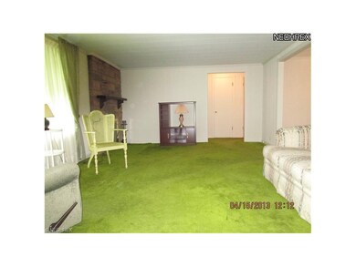 Hardwood floors under carpet! Stone fireplace with