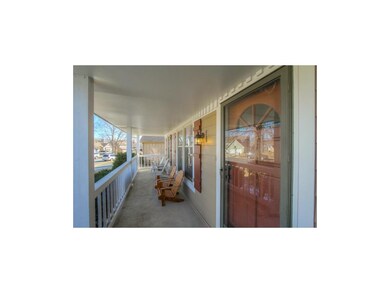 Lovely cover, front porch.  Sit back and relax.