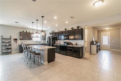 Chef's kitchen with upgraded granite countertops.