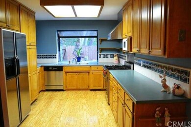 The sizable kitchen features upgraded appliances, 