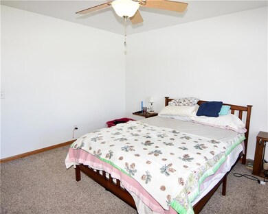 Master bedroom with attached private bathroom.