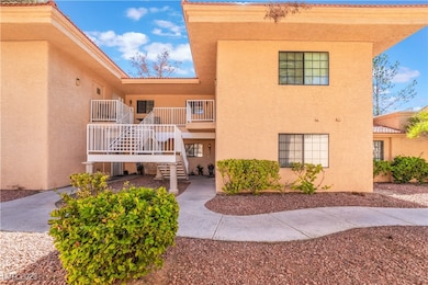 View of building exterior featuring stairway