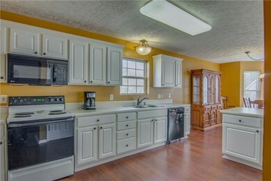 Large Kitchen with newer dishwasher, built in micr