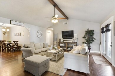 High ceilings, laminate wood floors and soft paint
