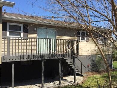 A view of the deck off the kitchen.