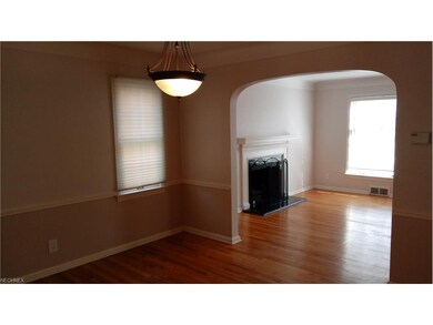 DINING ROOM LOOKING INTO LIVING ROOM WITH SAME BEA