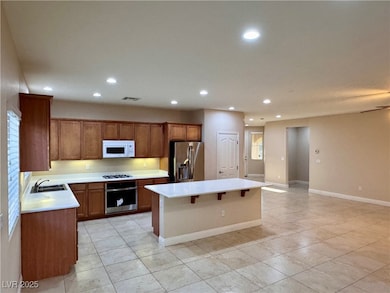 Kitchen featuring appliances with stainless steel