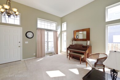 Living room with lots of windows.