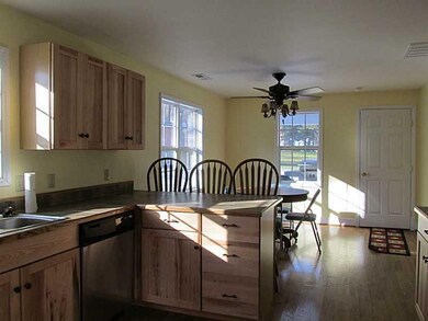Kitchen. Looking towards the laundry room entry (w