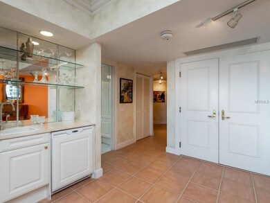 Wet bar and foyer looking toward master bedroom ha
