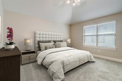 Large primary bedroom with vaulted ceilings, new c