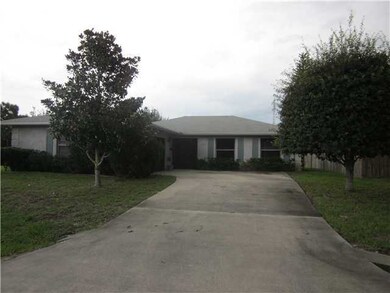 Exterior Front. Corner Lot, Long Driveway, Side En