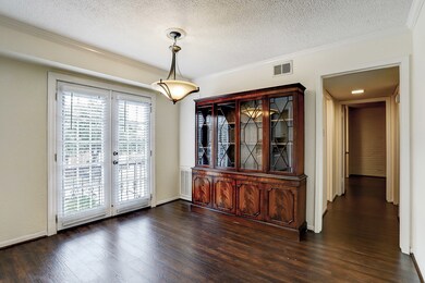 Additional view of the formal dining room and hall