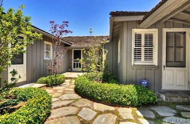 Front of the home showing three separate entry way