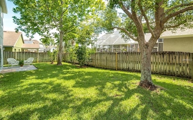 Good size fenced in back yard with shade trees.