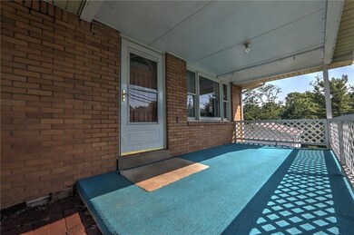 Cute front porch welcomes you home.