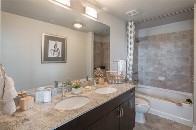 complete with a spacious walk-in shower/tub combo,