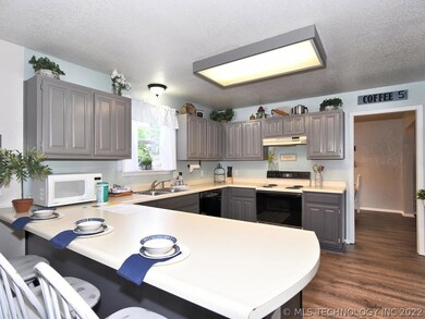View of Large Bar-top Dining. Convenient over Sink