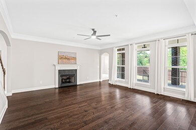 Large windows for great natural lighting and a fireplace for cozy ambience.