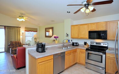 Kitchen and gathering area w/ fireplace