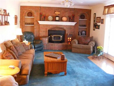 Family Room. Family Room with Log Burning Fireplac