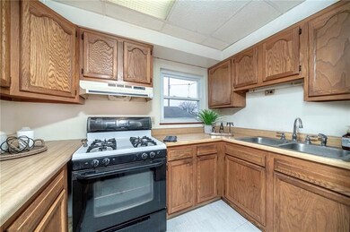 Quaint and cozy kitchen with gas range.