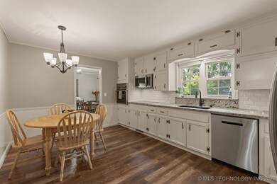 Updated Kitchen Overlooks the Backyard