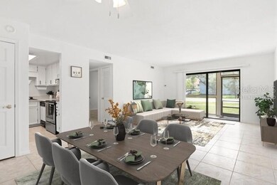 Virtually staged dining area open to living area
