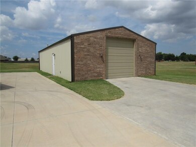 This shop is every man's dream!  27'x50' with 10 f