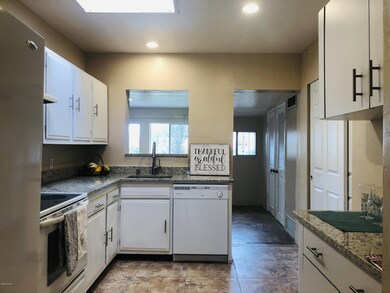 Kitchen with granite countertops