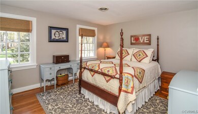 Master Bedroom with Hardwood Floors