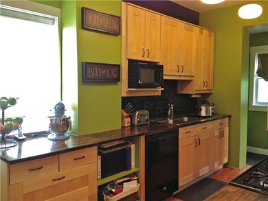 Kitchen. Kitchen opens up to mud room leading to r