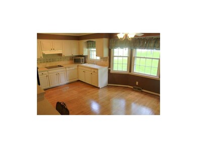 Gather Together in Open Eat-In Kitchen Overlooking