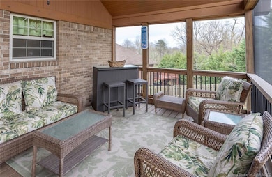 12' x 22' covered deck overlooks inground pool