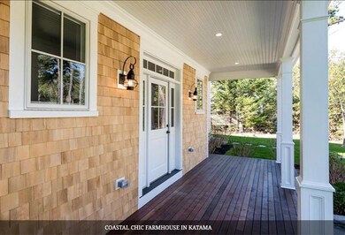 Photo of a similar home showing front porch area