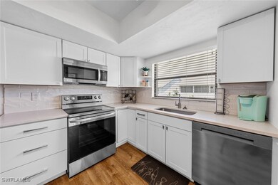 Kitchen featuring a sink, stainless steel applianc