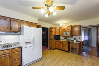 Leads to dining room and to large family room with