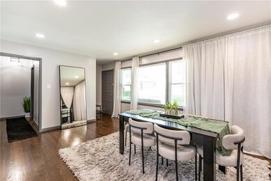 Dining area featuring dark hardwood / wood-style flooring