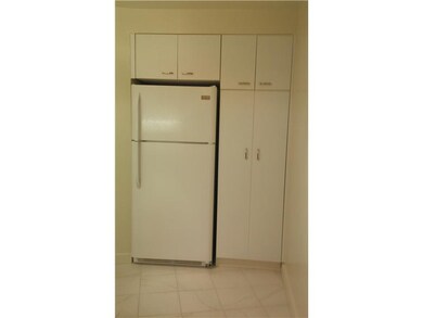 Kitchen. new refrigerator and floor.