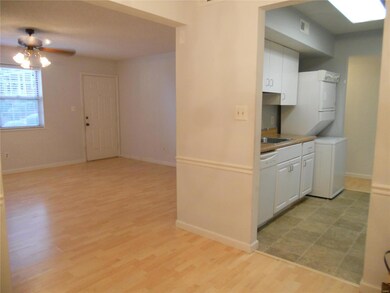 Dining room looking into the living room and kitch