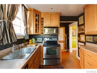 Great details and lots of cabinets. Nice flow to first floor full bath and dining room.