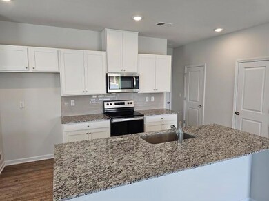Kitchen featuring stainless steel appliances, visi