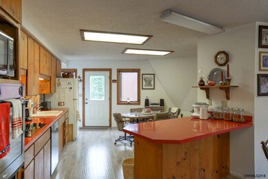 Kitchen has room for a table inside the kitchen an