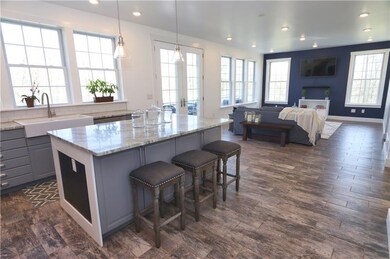 Subway tile backsplash, granite countertops, farmh