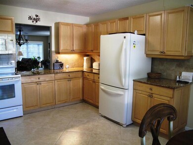 Remodeled eat in kitchen with granite co