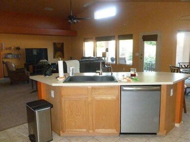 Kitchen island w/stainless steel appli.