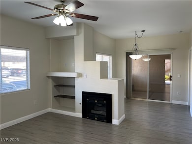 Unfurnished living room with wood finished floors,